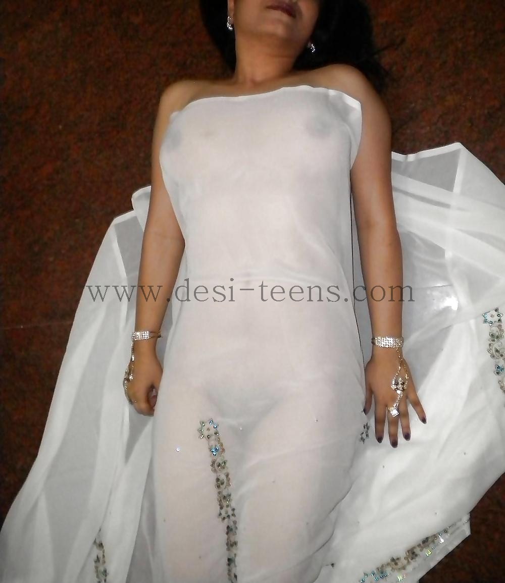 Cute_Desi_WIfe_Stripping_Her_White_Saree_To_Reveal_Her_Naked_Body_To_Her_Husband__4_.jpg